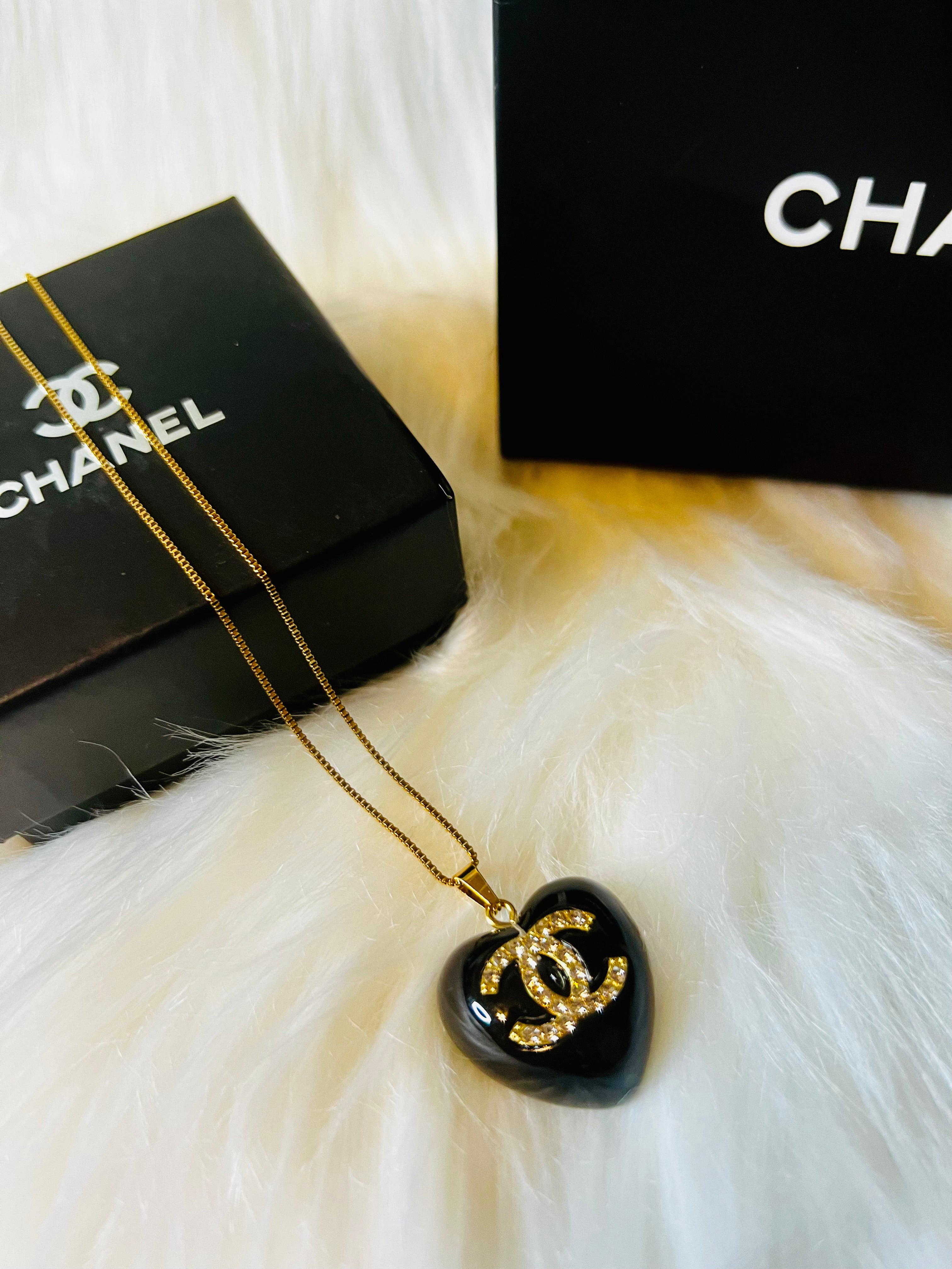 CHANEL Black Stone with Gold Lettering Heart Pendant Necklace