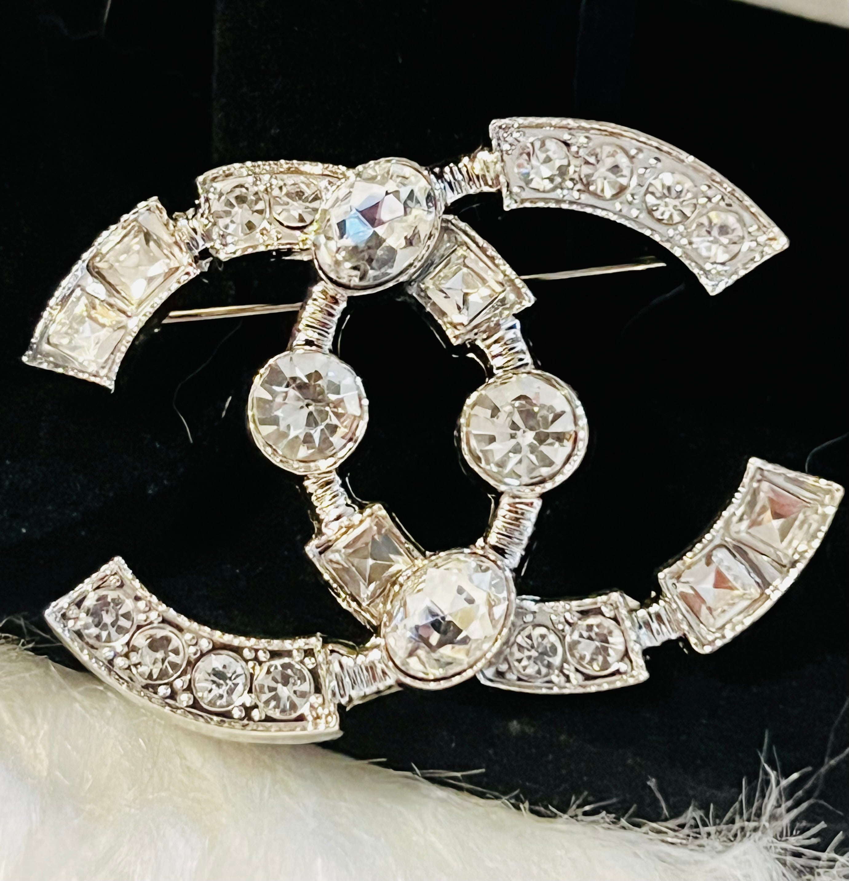CHANEL Silver with Rhinestone Accent Brooch