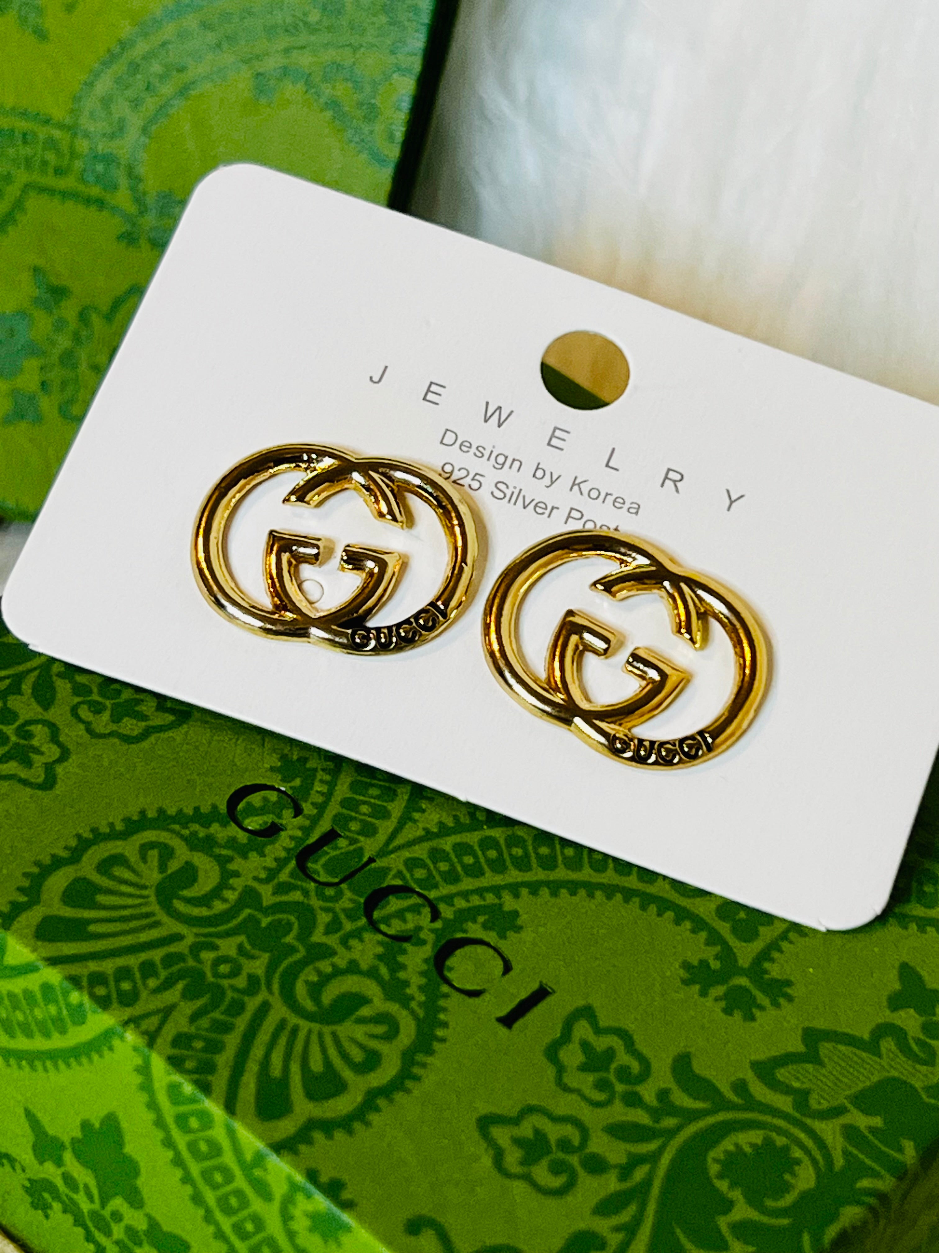 Gucci Iconic Logo Gold Stud Earrings